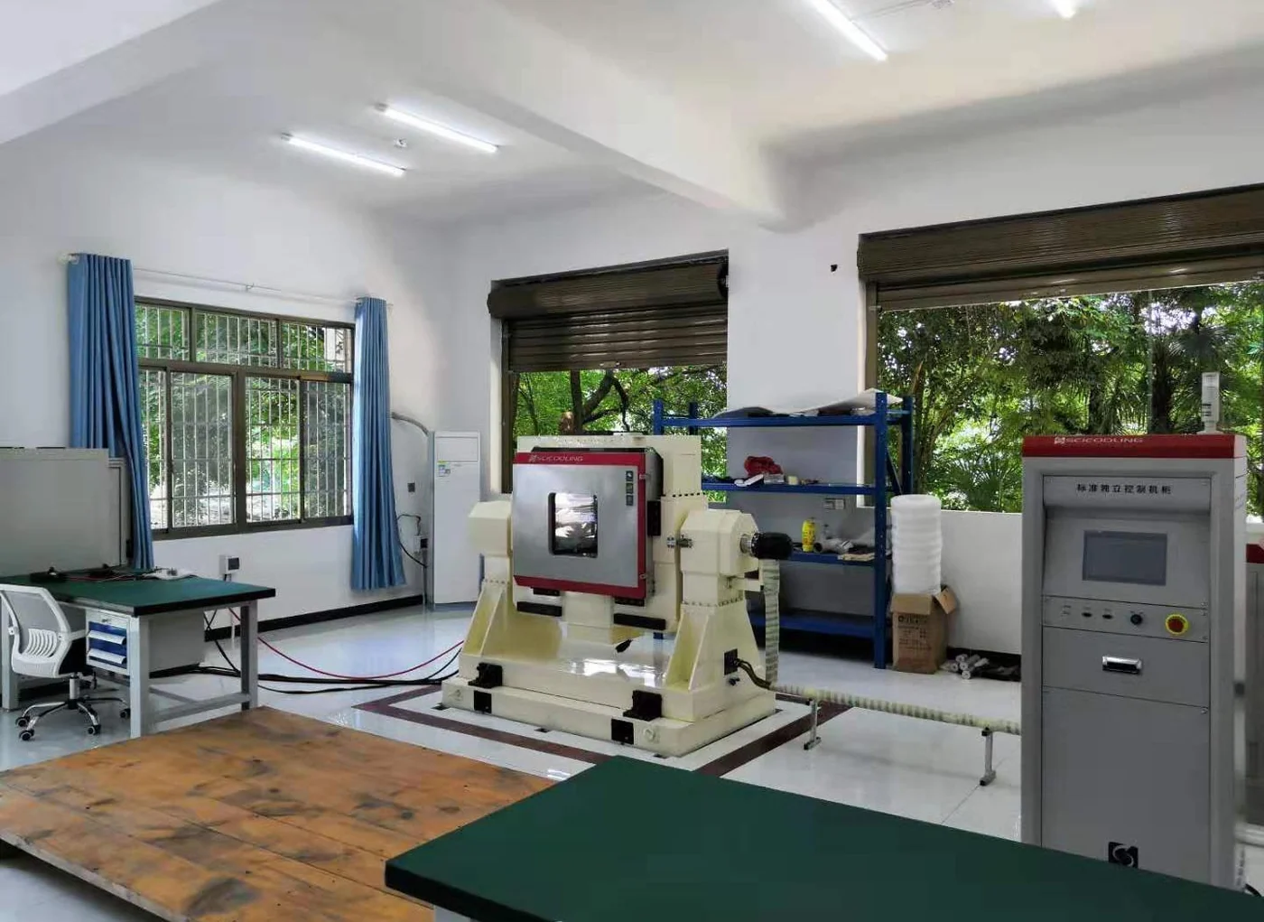 A calibration turntable and environmental test equipment in a laboratory